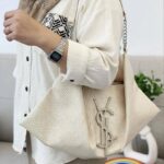 کیف کنفی تابستانی زنانه YSL مدل هوبو کرم