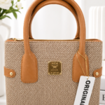 کیف دستی زنانه طرح ام سی ام (MCM) کرم قهوه ای