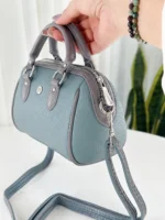 ALT: کیف مینی صندوقی زنانه توسکا آبی طوسی دستهدار