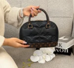 ALT: کیف دستی زنانه طرح لویی ویتون مشکی قهوه‌ای مدل گنبدی