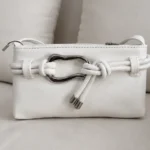 ALT: کیف مینی دوشی زنانه سفید مدل سگک‌دار