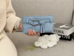 ALT: کیف مینی دوشی زنانه آبی آسمانی مدل سگکدار