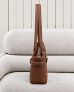 ALT: کیف دوشی زنانه قهوه‌ای سگک‌دار جنس صابونی
