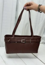 ALT: کیف دوشی زنانه قهوه‌ای سگک‌دار جنس صابونی