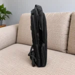 کوله پشتی تومی مشکی چندزیپ نمای جانبی
